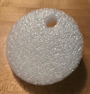 Custom die cut foam packaging insert with hole